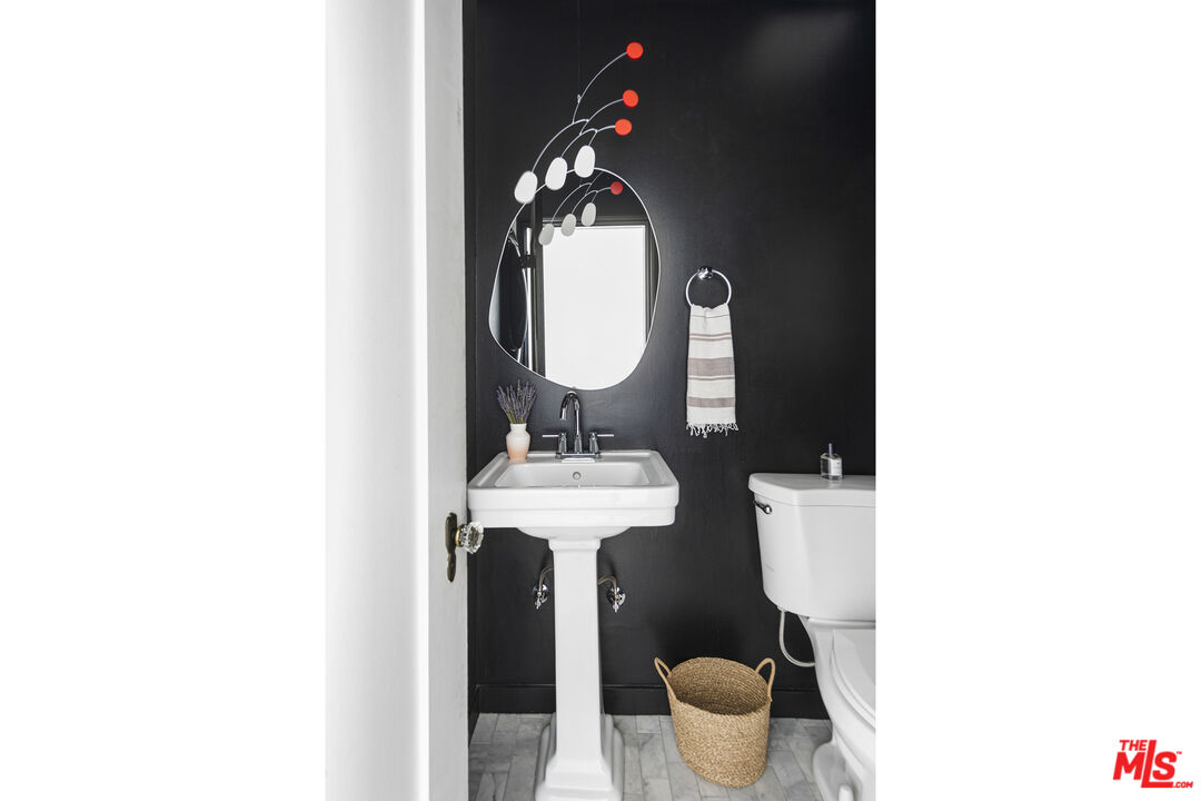 246 Robinson Road Pasadena, CA 91104 - Photo 23 of 43 a bathroom with a toilet and a sink