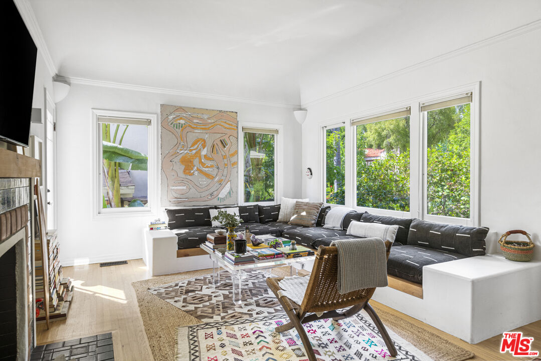246 Robinson Road Pasadena, CA 91104 - Photo 3 of 43 a living room with furniture large window and flat screen tv