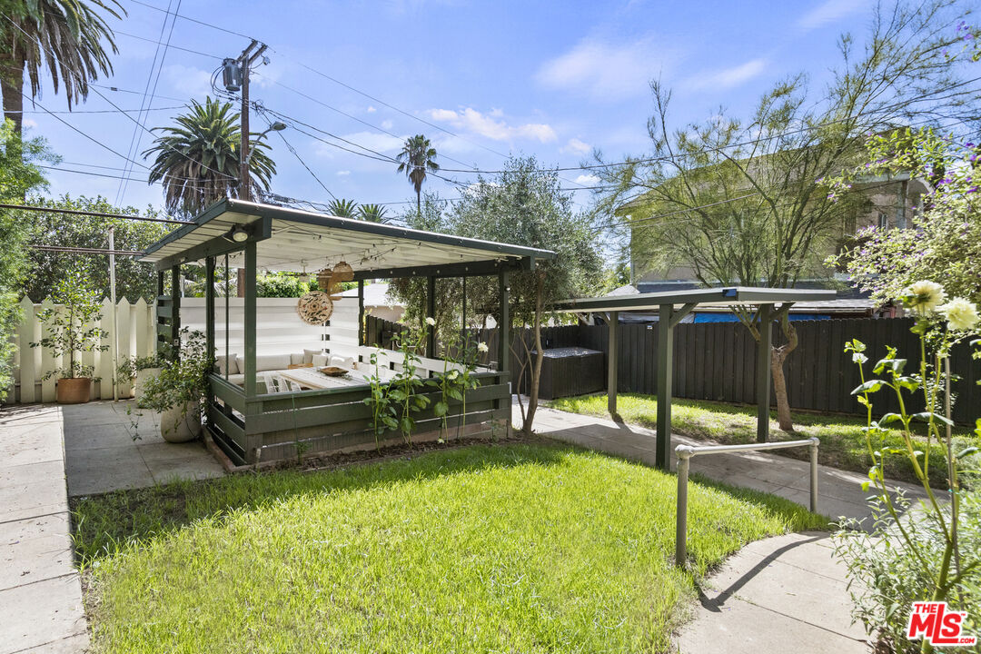 246 Robinson Road Pasadena, CA 91104 - Photo 31 of 43 a view of a chair and tables in the patio