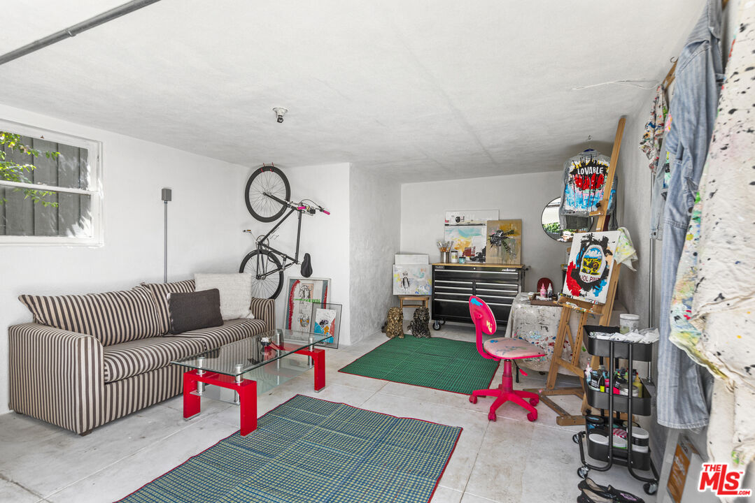 246 Robinson Road Pasadena, CA 91104 - Photo 35 of 43 a living room with baby toys and a couch