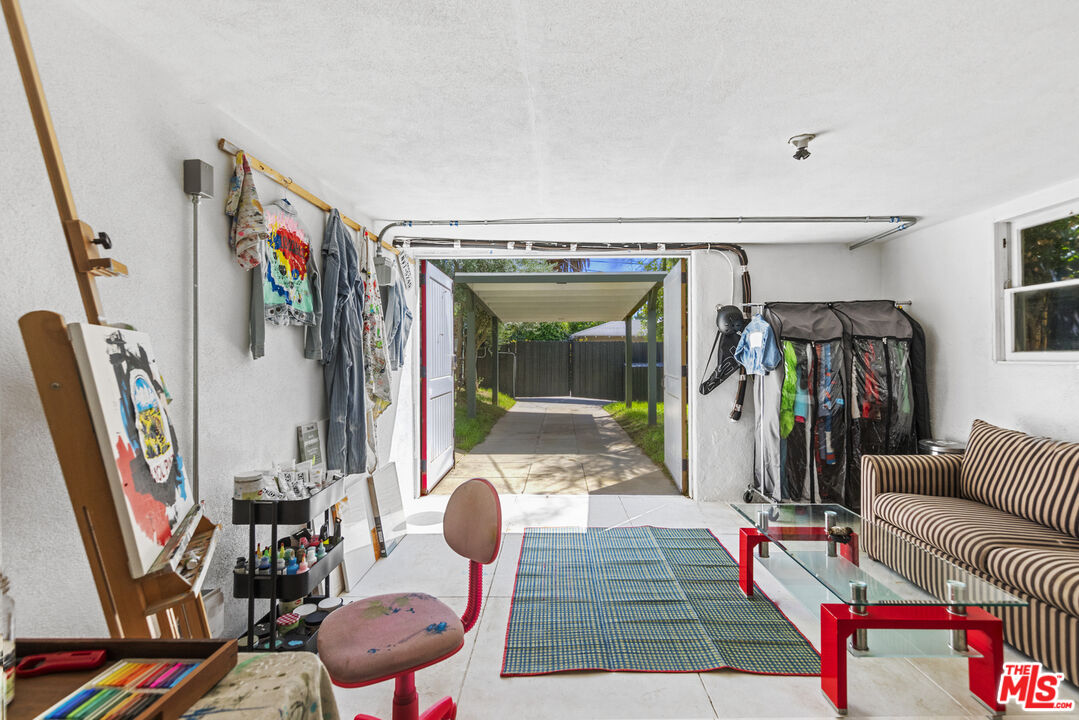 246 Robinson Road Pasadena, CA 91104 - Photo 36 of 43 a living room with furniture and a book shelf