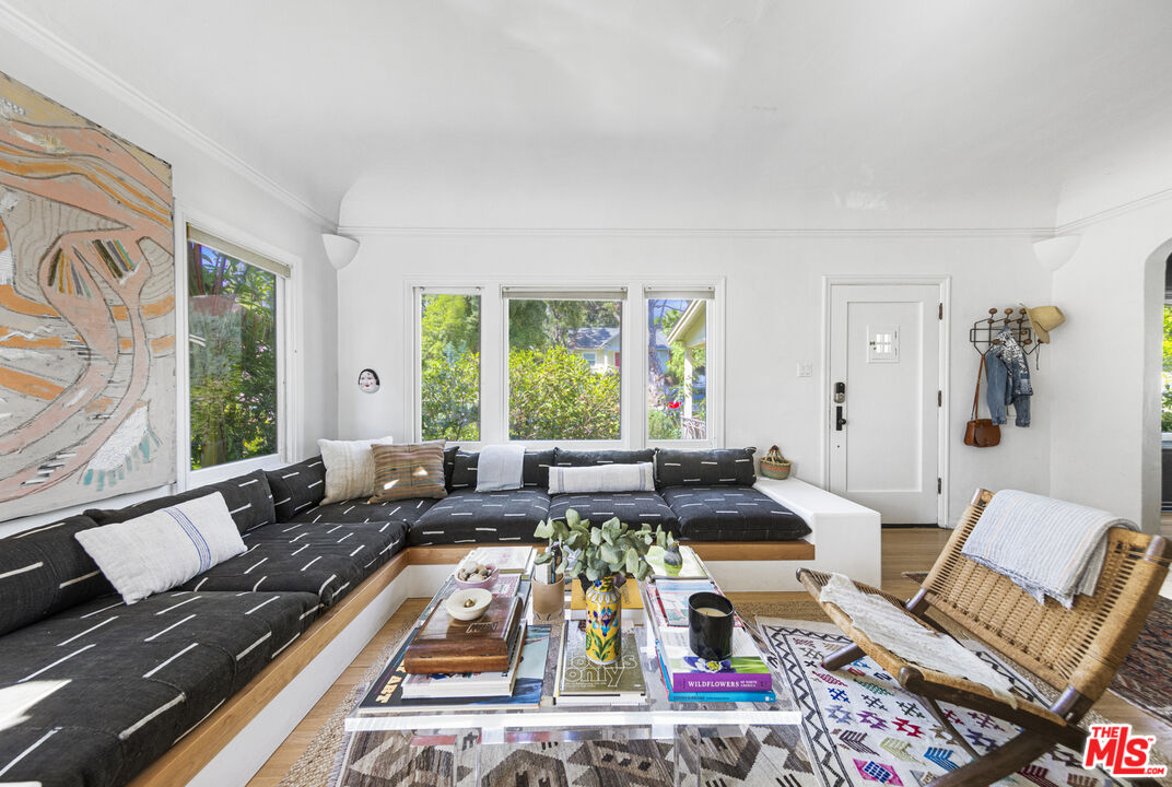 246 Robinson Road Pasadena, CA 91104 - Photo 5 of 43 a living room with furniture large window and a table