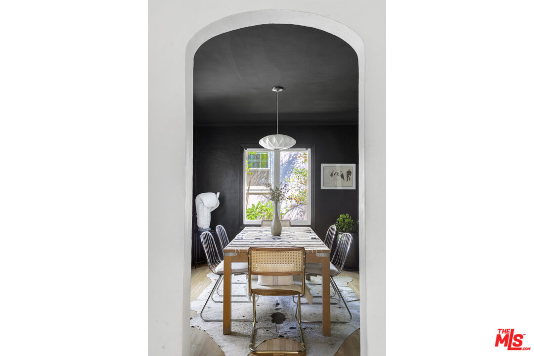 246 Robinson Road Pasadena, CA 91104 - Photo 9 of 43 a living room with furniture and a table