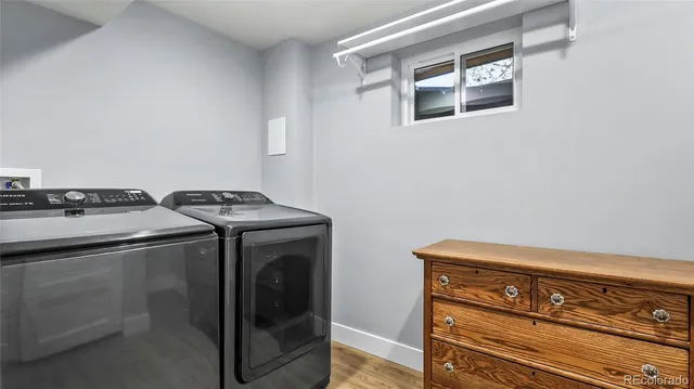 a utility room with dryer and washer