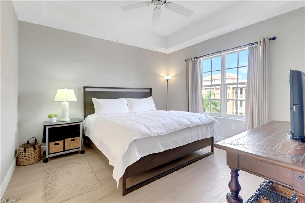 401 Bayfront Place, Unit 3502 Naples, FL 34102 - Photo 7 of 22 Bedroom with wood finished floors and a ceiling fan