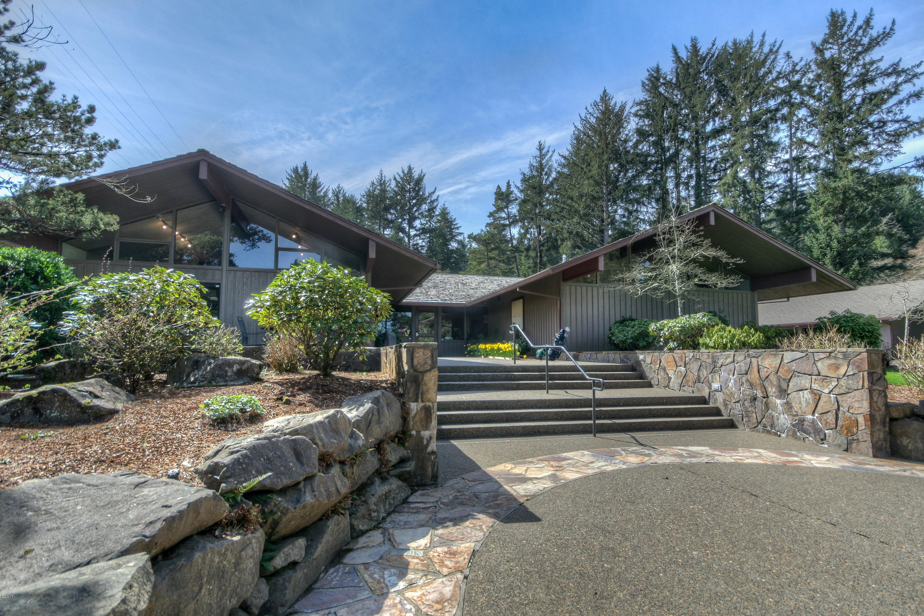 17 Big Tree Road Gleneden Beach, OR 97388 - Photo 39 of 52 a view of a house with a yard and furniture
