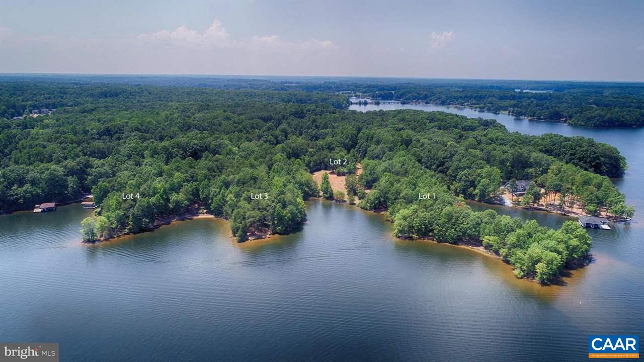 0 Busbees Point Road Bumpass, VA 23024 - Photo 7 of 10 an aerial view of a city with lots of residential buildings and mountain view in back