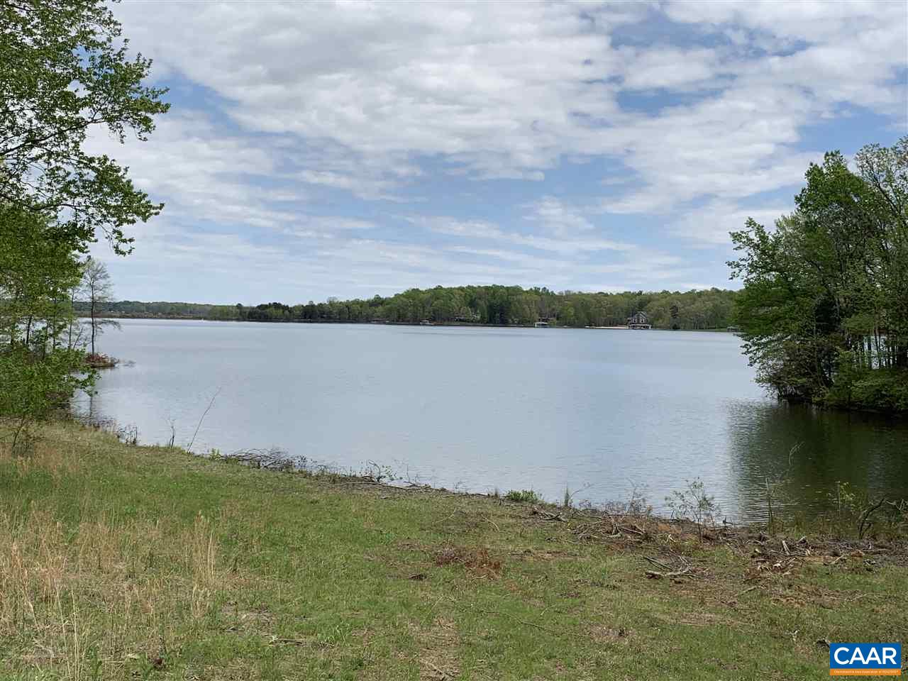 0 Busbees Point Road Bumpass, VA 23024 - Photo 9 of 10 a view of a lake from a yard