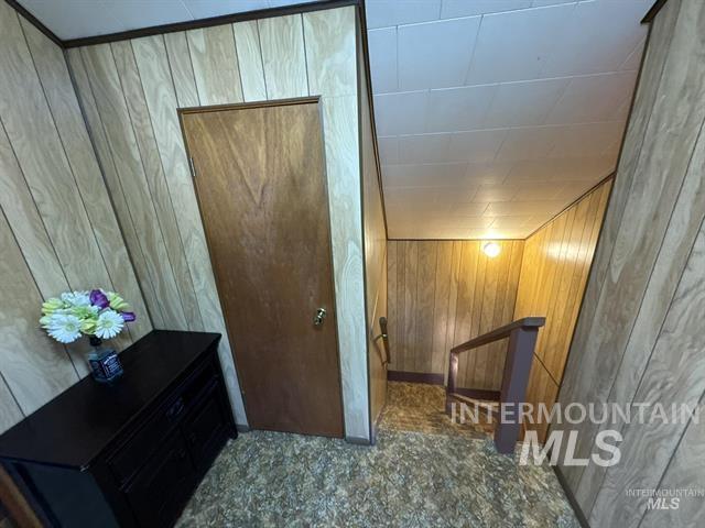 217 Main Street Kooskia, ID 83539 - Photo 20 of 34 Hall with an upstairs landing and paneling
