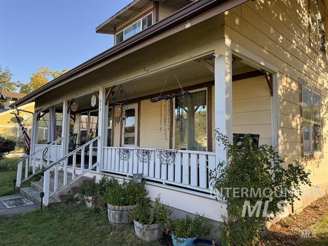 217 Main Street Kooskia, ID 83539 - Photo 3 of 34 View of property exterior with covered porch