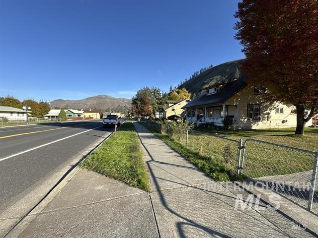 217 Main Street Kooskia, ID 83539 - Photo 31 of 34 View of asphalt street featuring a mountain view and sidewalks