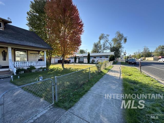 217 Main Street Kooskia, ID 83539 - Photo 34 of 34 Fenced front yard featuring a gate and covered porch