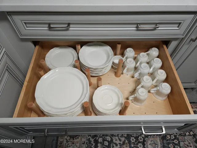 a bathroom with a toilet and a mirror
