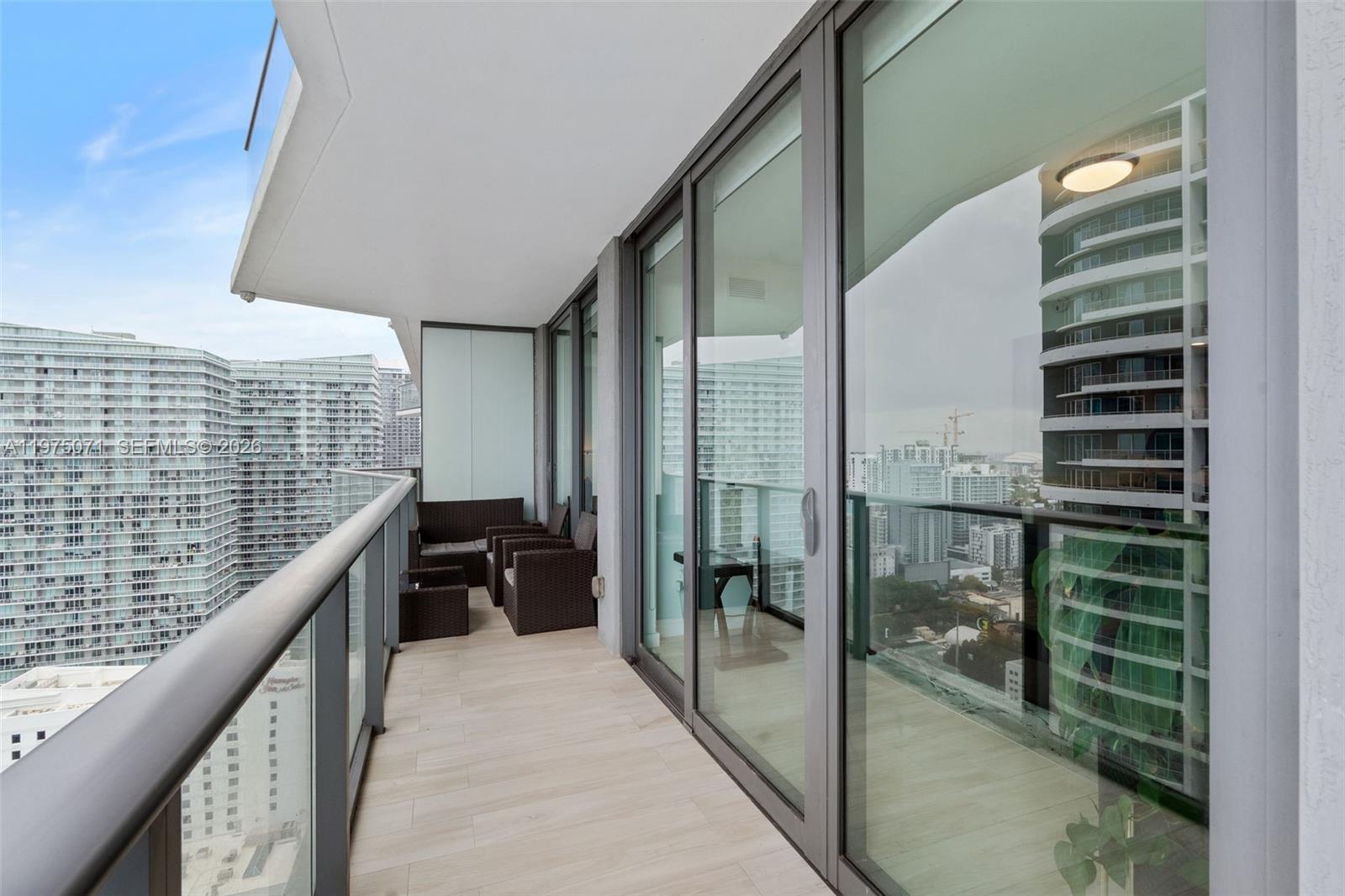 1300 South Miami Avenue, Unit 2807 Miami, FL 33130 - Photo 17 of 22 a balcony with view of living room