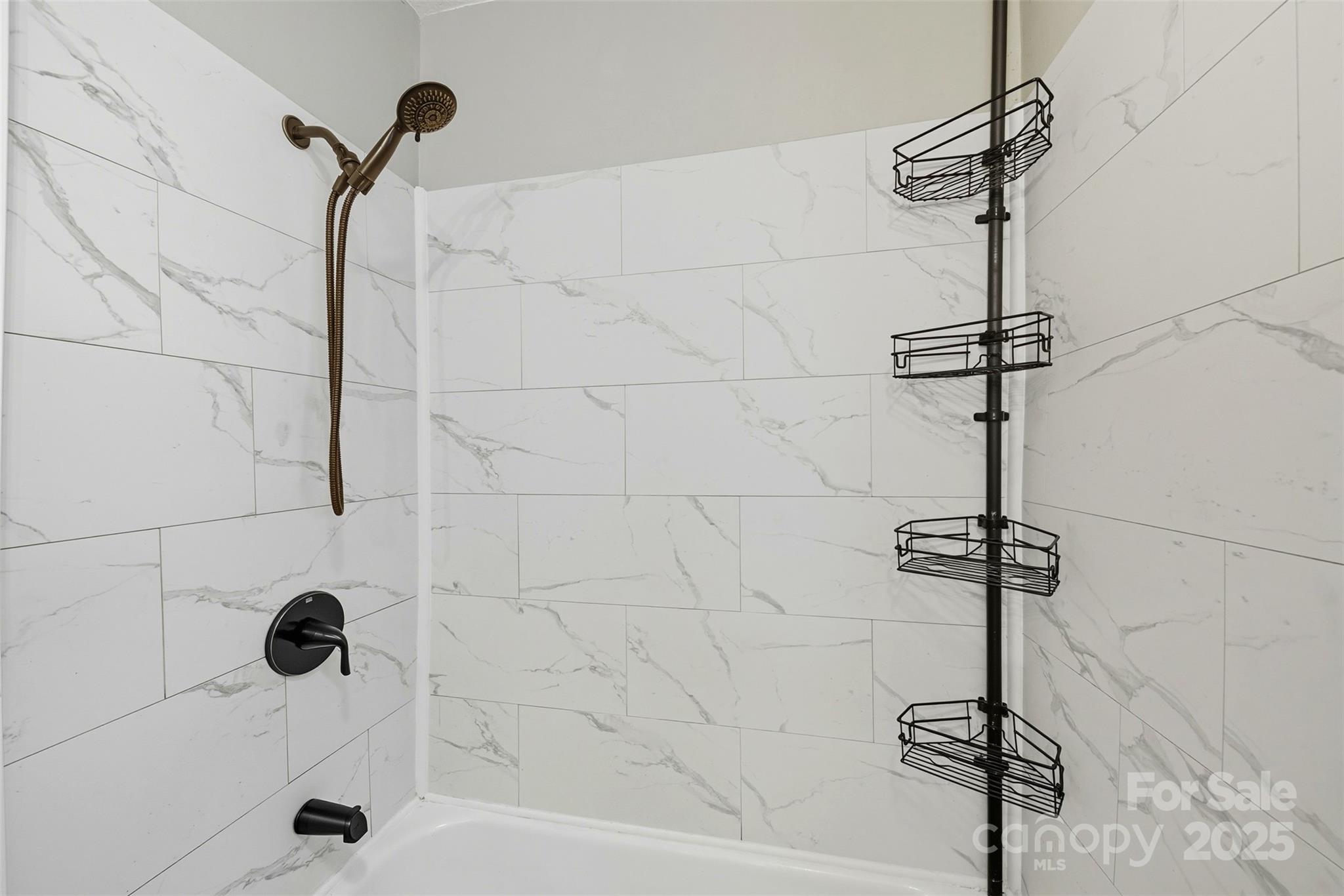 515 Suttle Street Shelby, NC 28150 - Photo 11 of 25 a bathroom with a shower