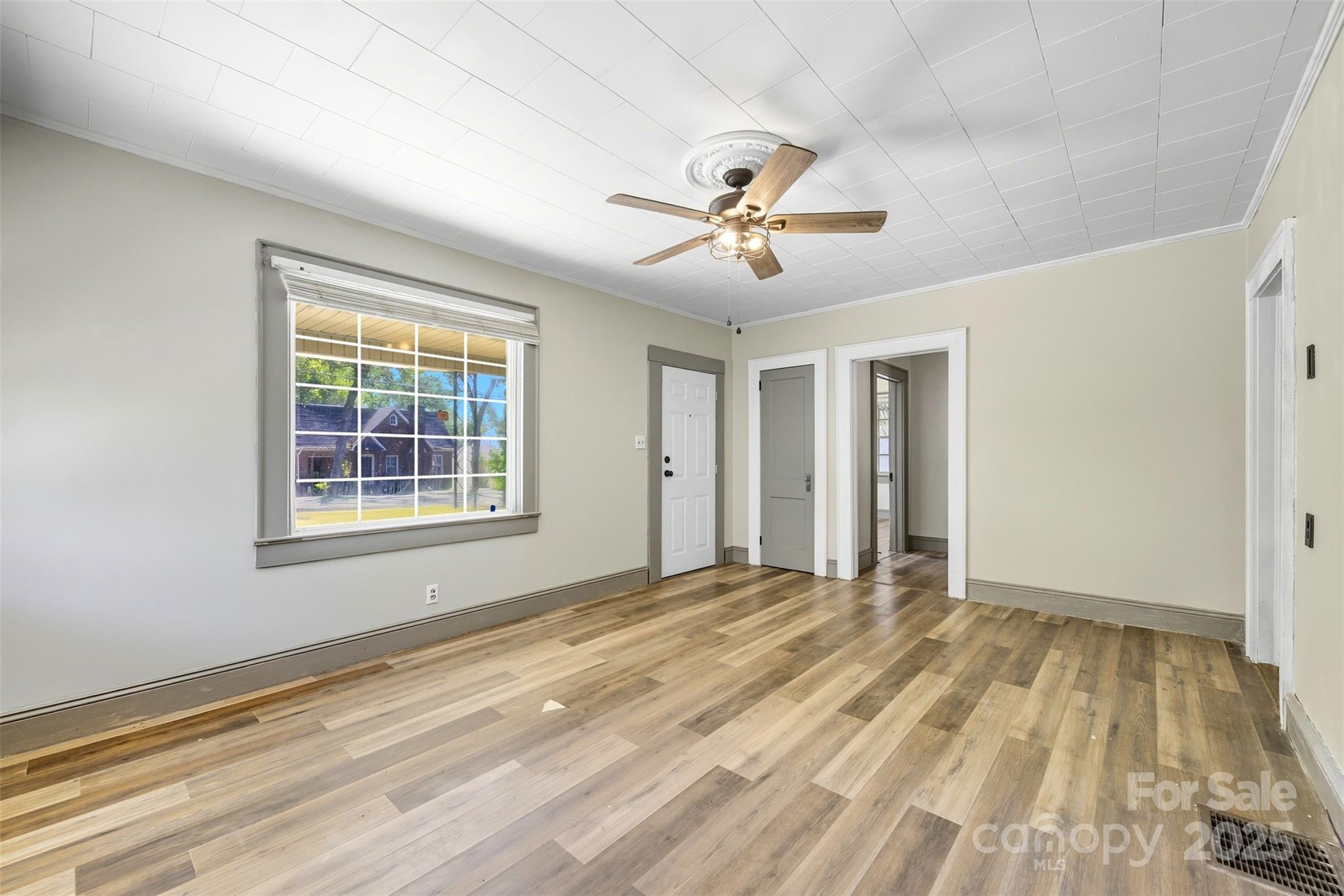 515 Suttle Street Shelby, NC 28150 - Photo 13 of 25 a view of an empty room with a window