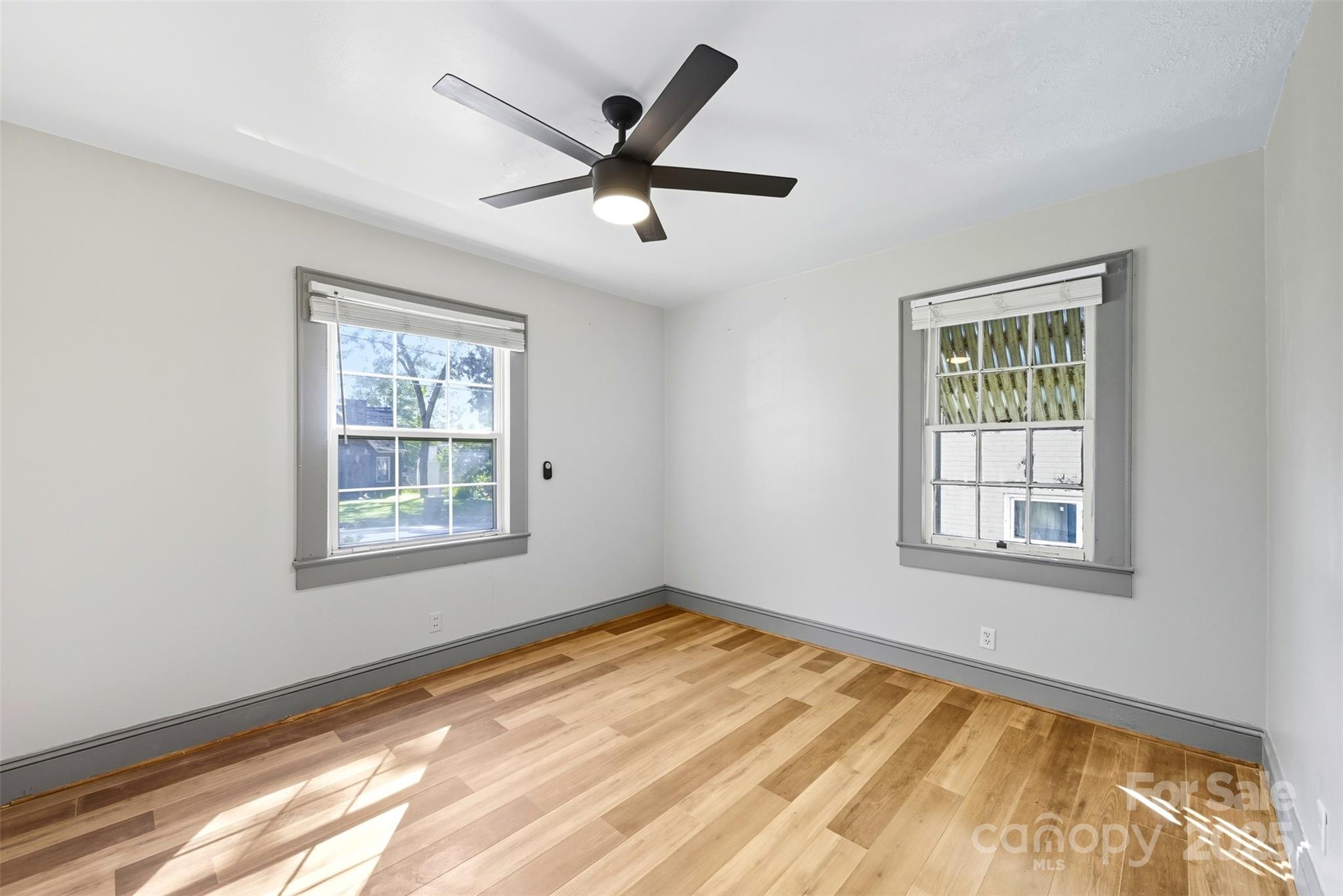 515 Suttle Street Shelby, NC 28150 - Photo 20 of 25 a view of an empty room with a window