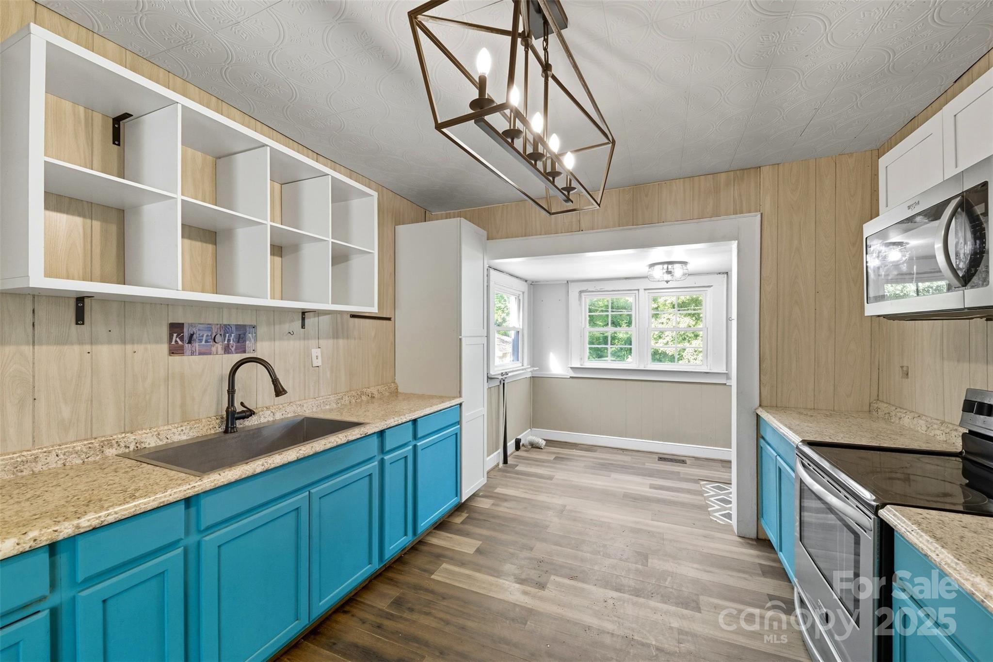 515 Suttle Street Shelby, NC 28150 - Photo 7 of 25 a kitchen with a sink and a window
