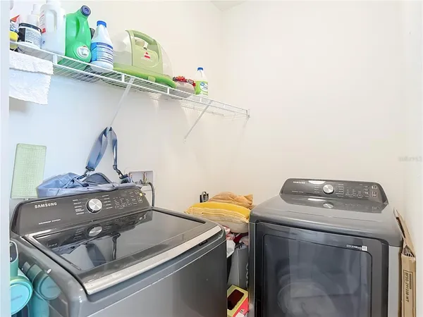 a view of a chairs and table on the terrace
