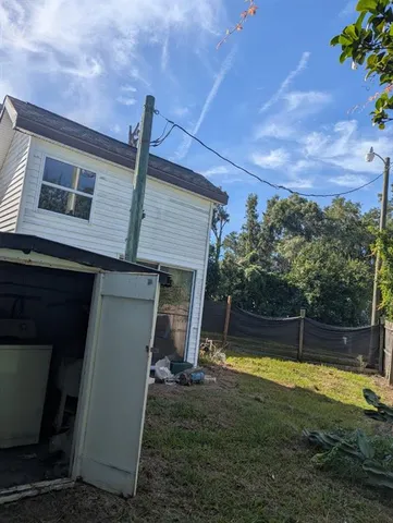 a view of a backyard with a tub