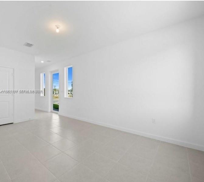 701 Southeast 14th Court Homestead, FL 33034 - Photo 11 of 18 a view of an empty room