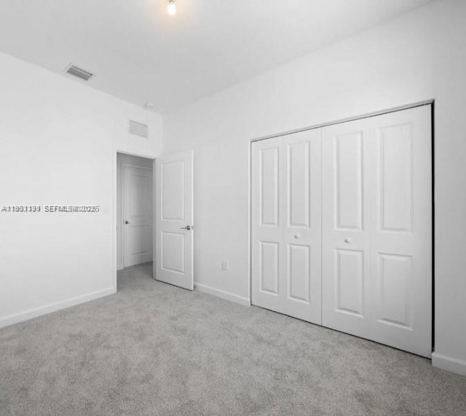 701 Southeast 14th Court Homestead, FL 33034 - Photo 16 of 18 a view of an empty room