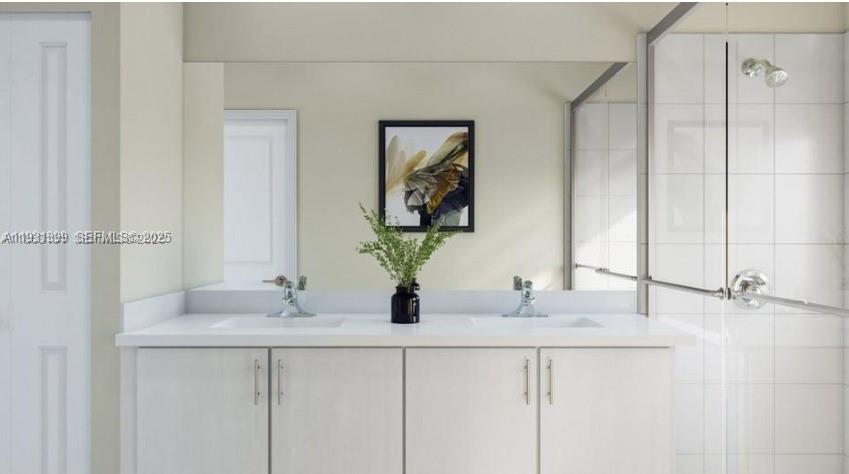 701 Southeast 14th Court Homestead, FL 33034 - Photo 4 of 18 a bathroom with a sink and a mirror