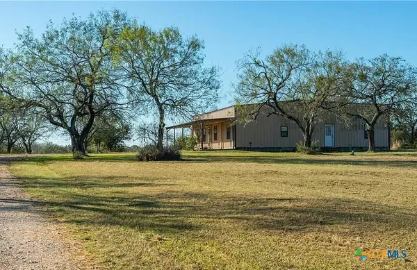 a house view with a outdoor space