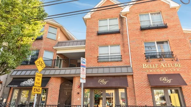 a front view of a building and a street