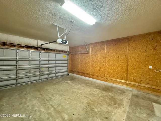 a view of backyard with green space