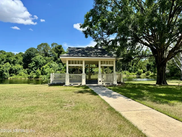 a view of a park with swings