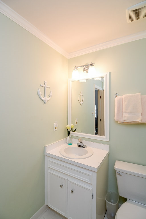 1108 Canoga Place Raleigh, NC 27615 - Photo 21 of 24 3rd Bedroom has 1/2 bath and shares access to the hallway full bath. Buddy Bath