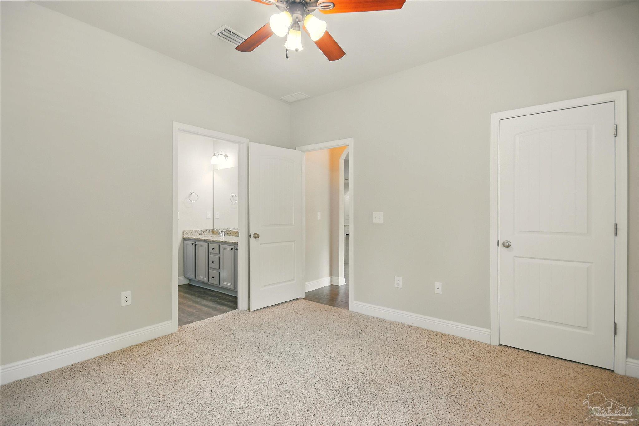 2701 Tulip Hill Road Pace, FL 32571 - Photo 18 of 42 wooden floor in an empty room