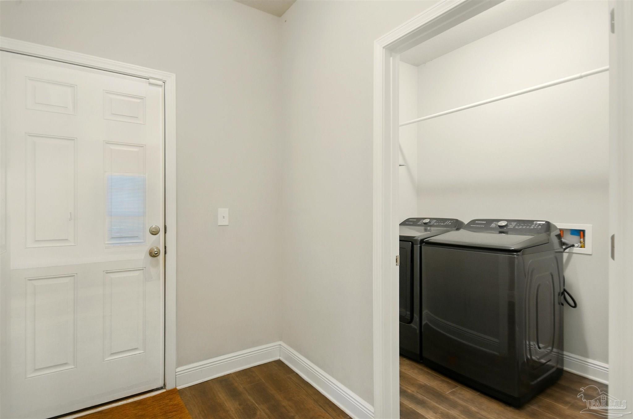 2701 Tulip Hill Road Pace, FL 32571 - Photo 27 of 42 a view of a utility room with washer and dryer