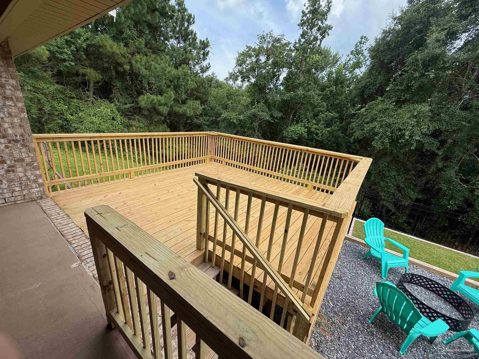 2701 Tulip Hill Road Pace, FL 32571 - Photo 34 of 42 a view of balcony with wooden floor and fence