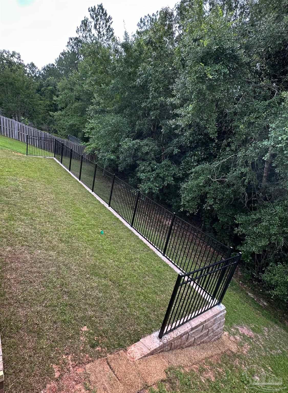 2701 Tulip Hill Road Pace, FL 32571 - Photo 41 of 42 a view of a tennis court