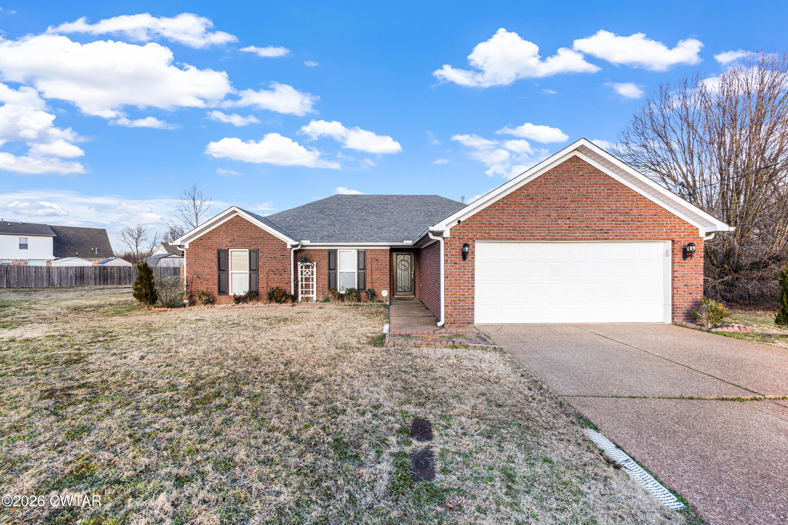 23 Matrix Cove Jackson, TN 38305 - Photo 1 of 19 a view of a house with a yard
