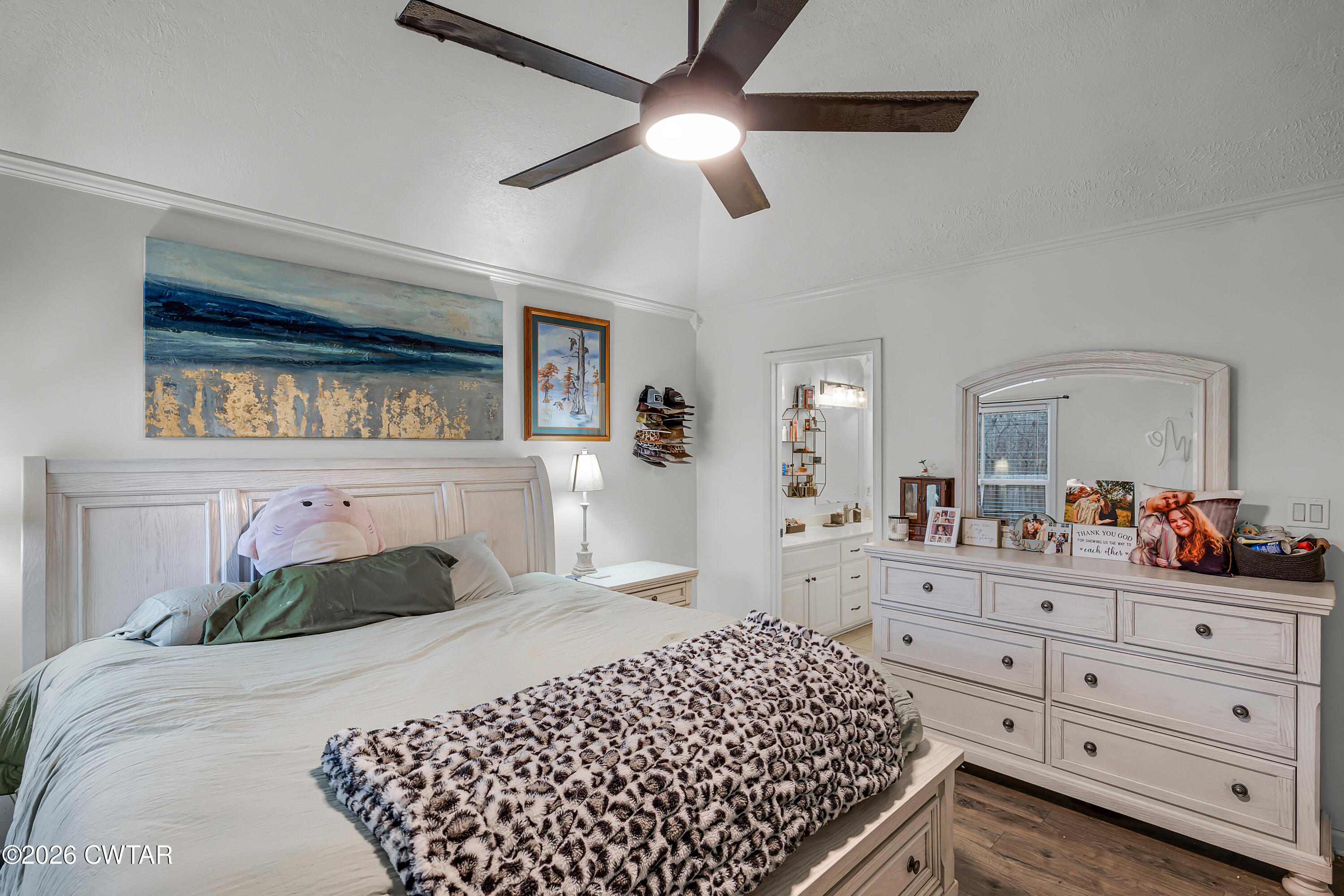 23 Matrix Cove Jackson, TN 38305 - Photo 11 of 19 a bedroom with a bed and a dresser in it