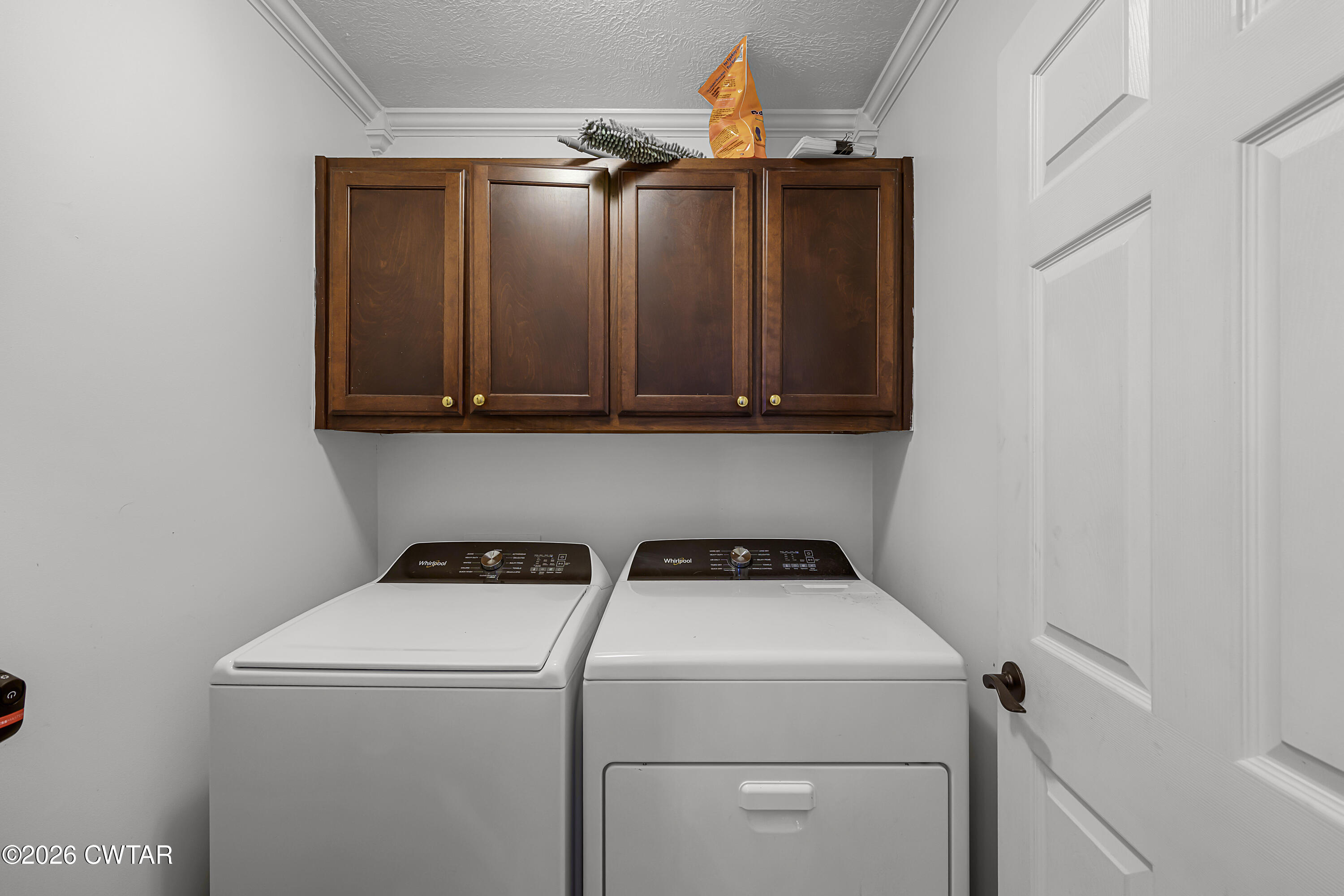 23 Matrix Cove Jackson, TN 38305 - Photo 17 of 19 a utility room with dryer and washer