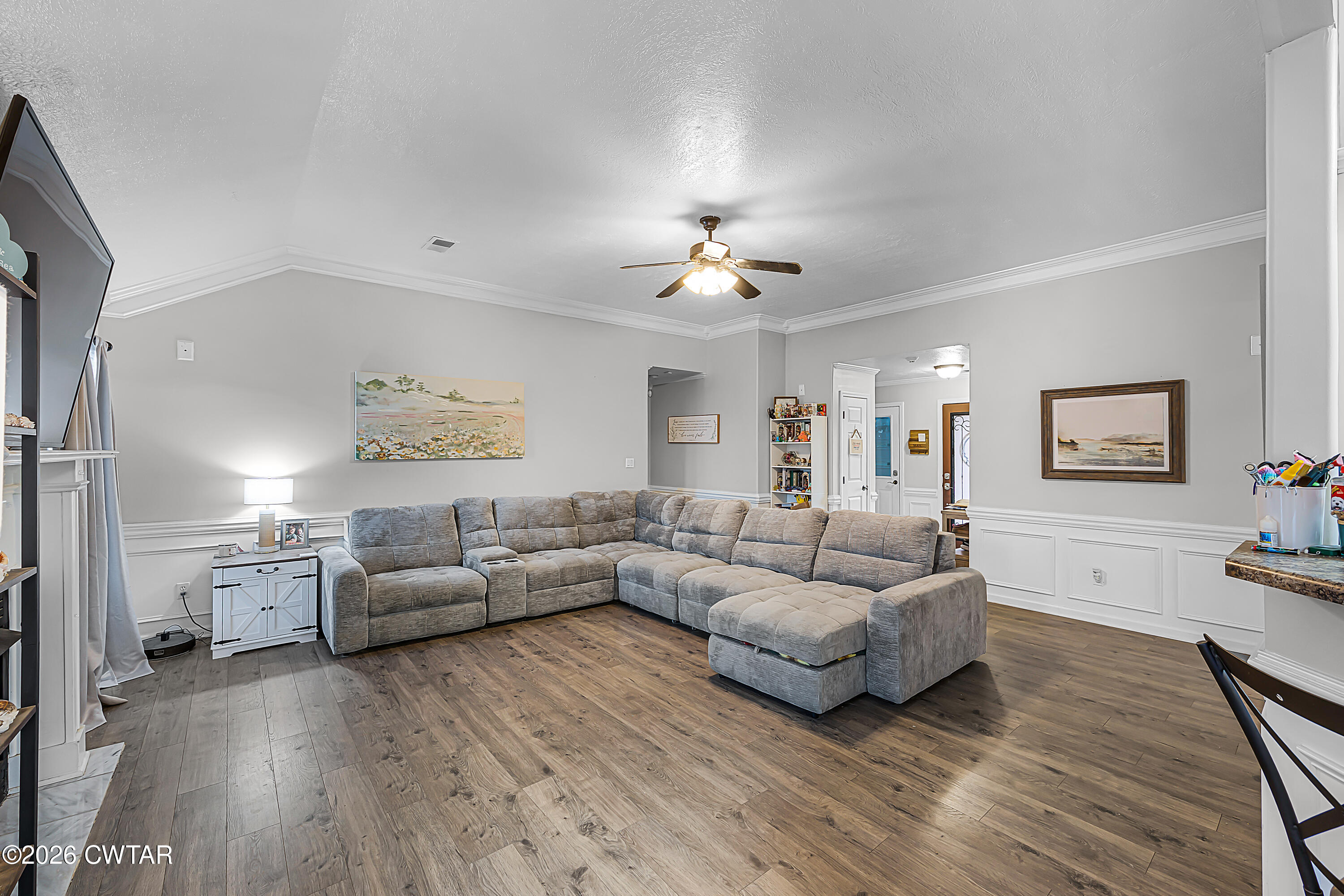 23 Matrix Cove Jackson, TN 38305 - Photo 2 of 19 a living room with furniture and a wooden floor