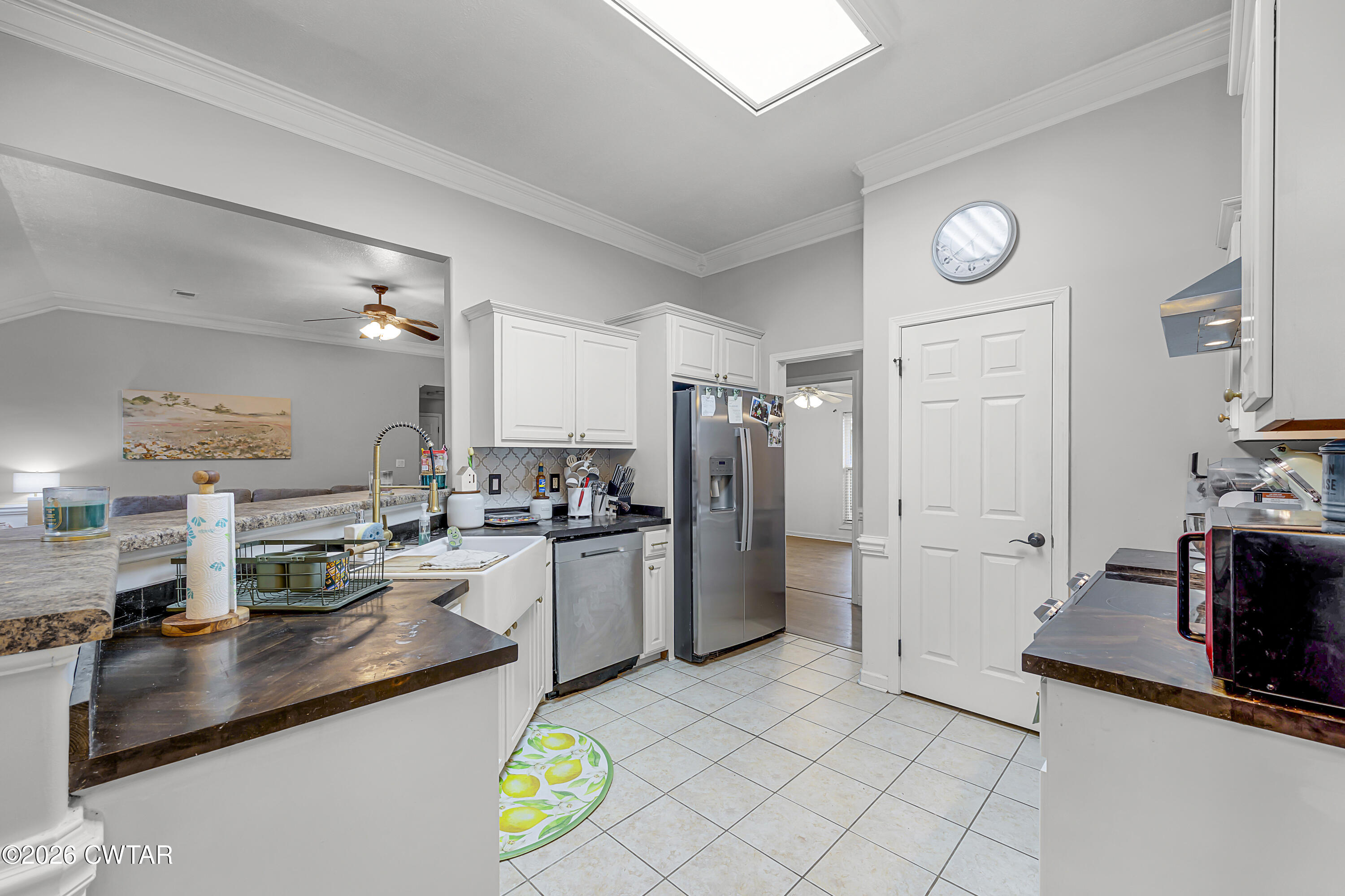 23 Matrix Cove Jackson, TN 38305 - Photo 7 of 19 a kitchen with refrigerator and cabinets