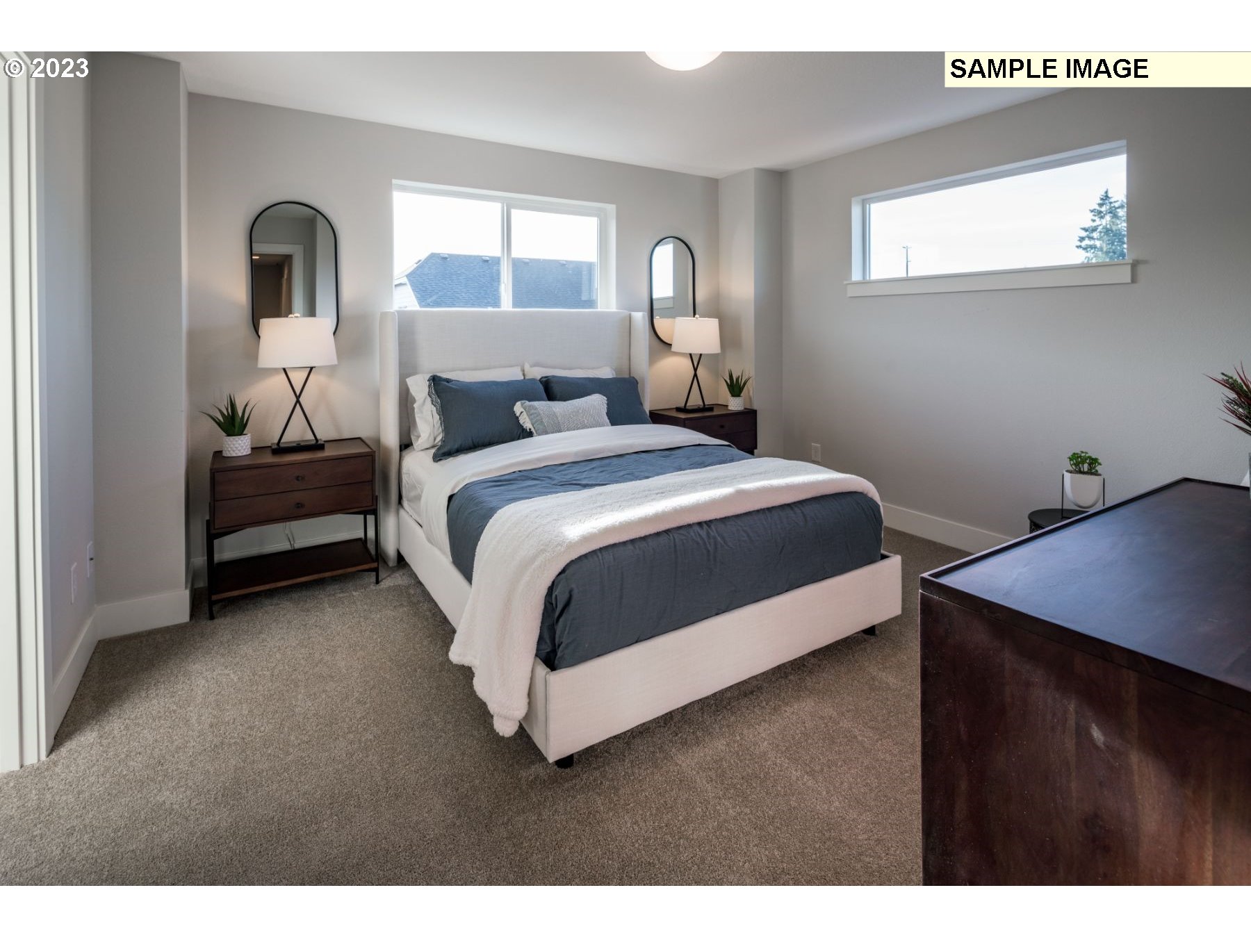 723 Northwest 174th Street Ridgefield, WA 98642 - Photo 13 of 20 a bed room with a bed and a window