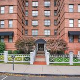 a front view of a multi story residential apartment building