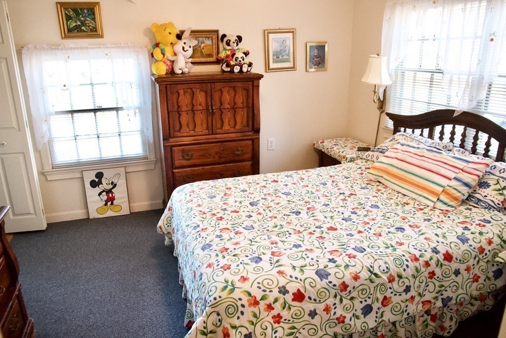 64 Lincoln Point Road Charlton, MA 01507 - Photo 14 of 28 a bedroom with a bed and a window