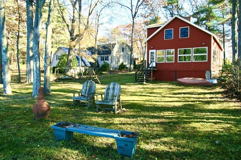 64 Lincoln Point Road Charlton, MA 01507 - Photo 2 of 28 a view of a house with a yard