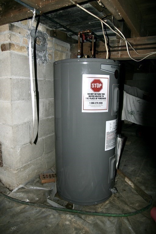 64 Lincoln Point Road Charlton, MA 01507 - Photo 23 of 28 a view of water heater room