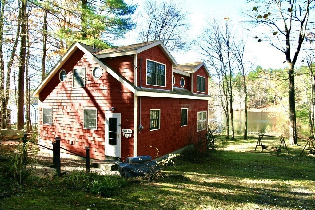 64 Lincoln Point Road Charlton, MA 01507 - Photo 24 of 28 a front view of house with a garden