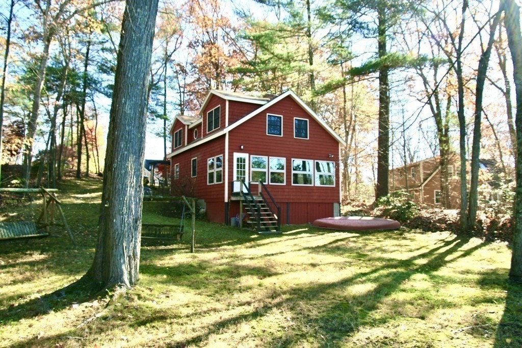64 Lincoln Point Road Charlton, MA 01507 - Photo 25 of 28 a view of house with backyard