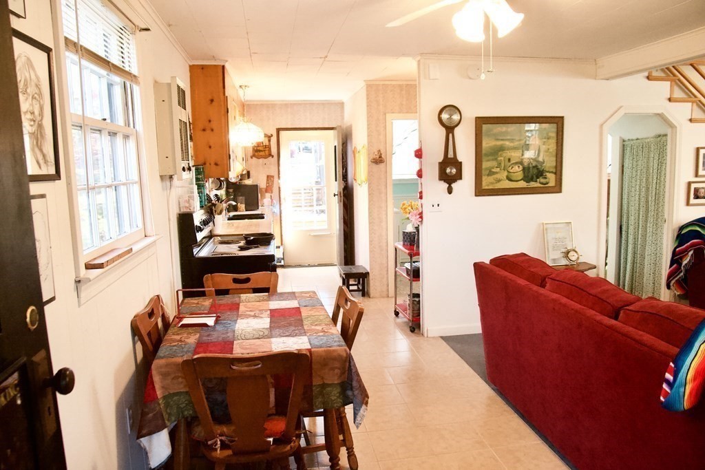 64 Lincoln Point Road Charlton, MA 01507 - Photo 5 of 28 a living room with furniture and a large window