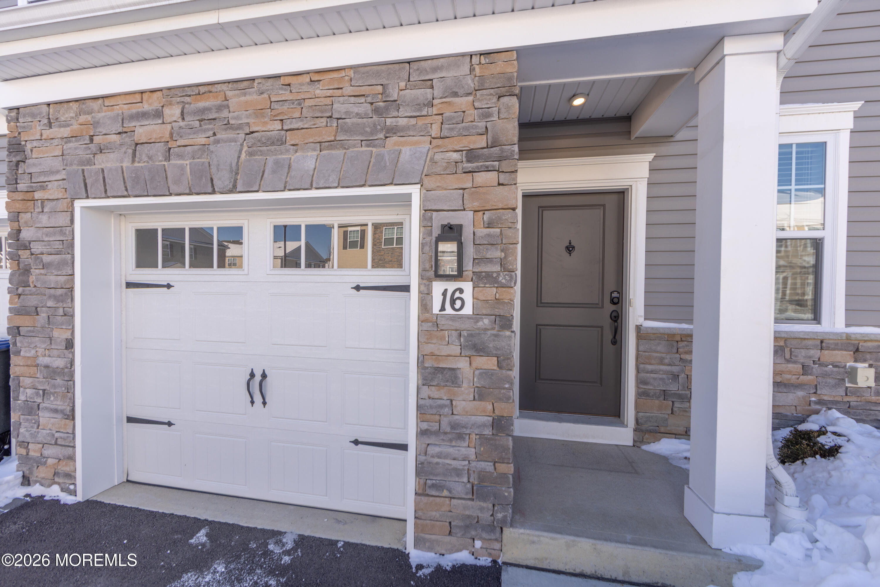 16 Chapel Lane Neptune, NJ 07753 - Photo 2 of 27 a view of a house with a glass door